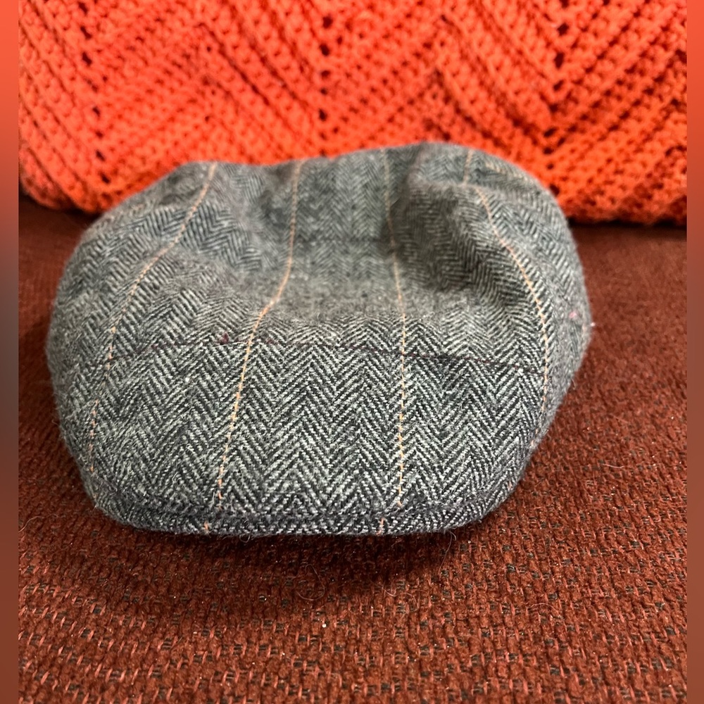 Source unknown on brand, skid lid, 90% polyester 10% wool , very nice